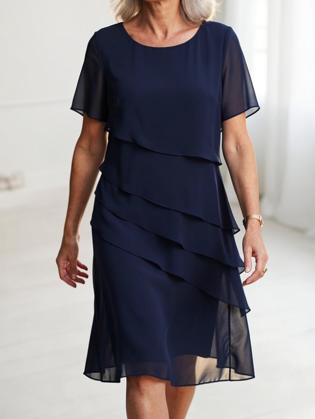 Juliette – Elegantna obleka s fluidno silhueto in volančki
