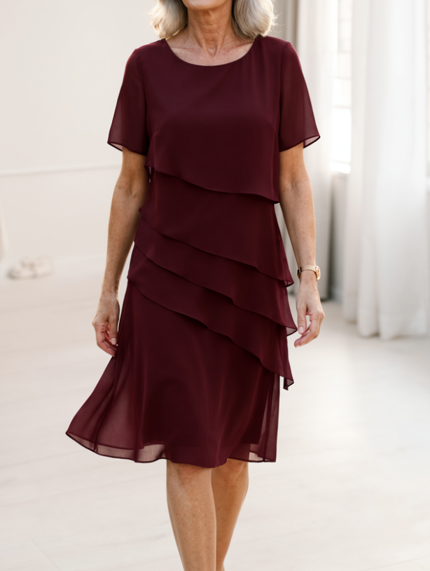 Juliette – Elegantna obleka s fluidno silhueto in volančki