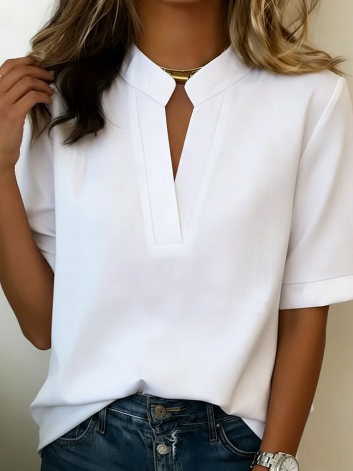 Margaux | Chic bluzica z V-izrezom in zlatimi detajli