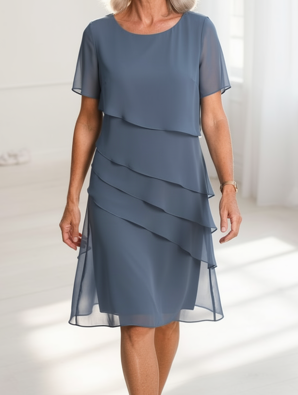 Juliette – Elegantna obleka s fluidno silhueto in volančki