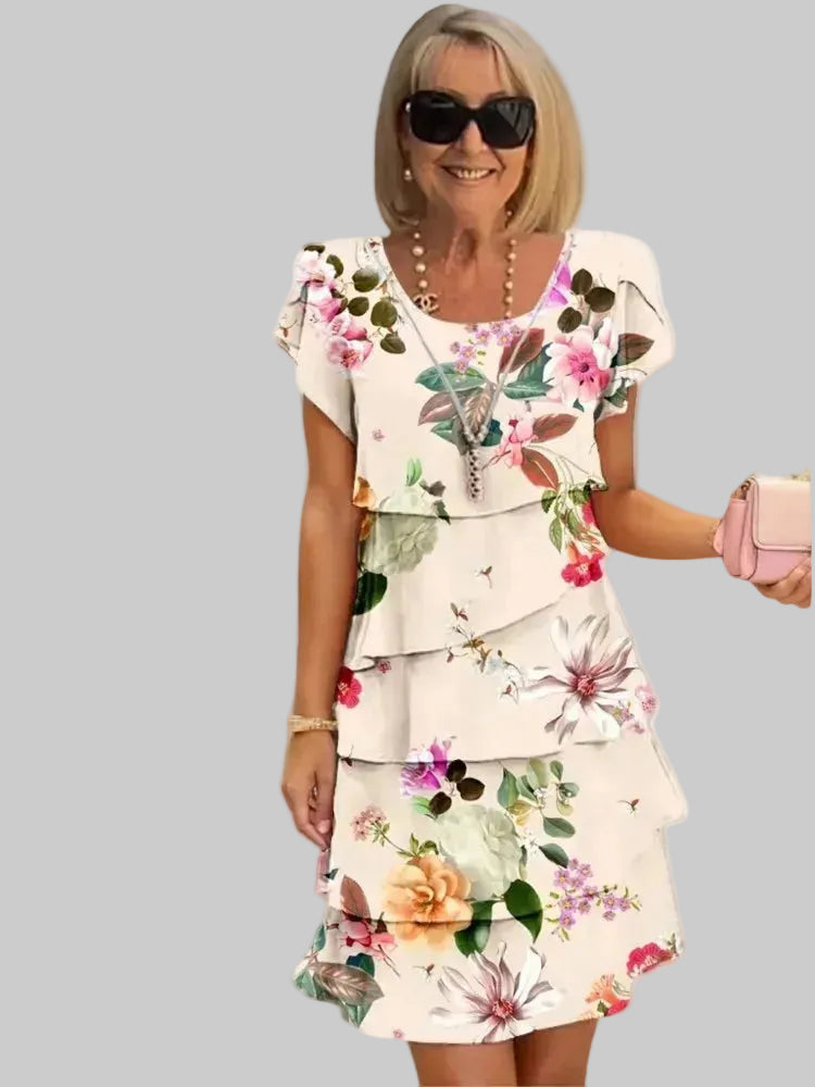 Camille – Elegantna obleka s tekočim krojem in volančki