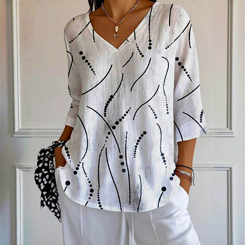 Esmee – Bluza z igrivimi crtami in lahkotnim krojem