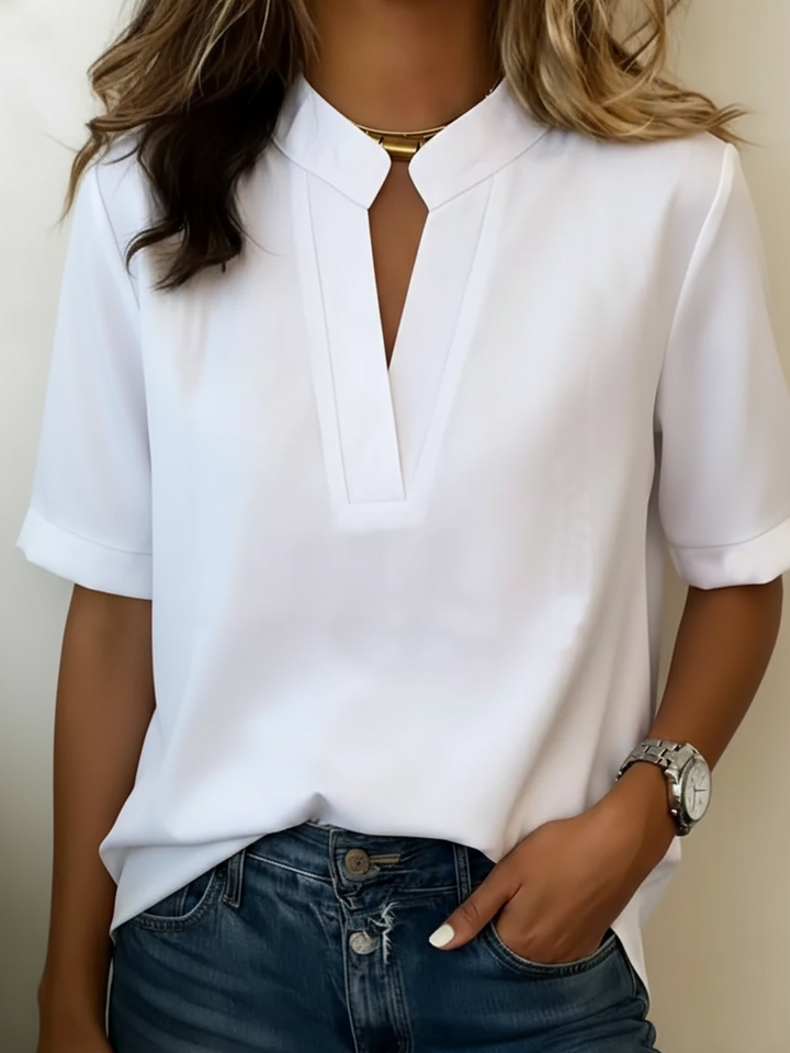 Margaux | Chic bluzica z V-izrezom in zlatimi detajli